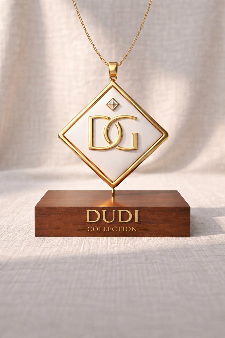 Dudi Collection logo – Dudi Group monogram pendant